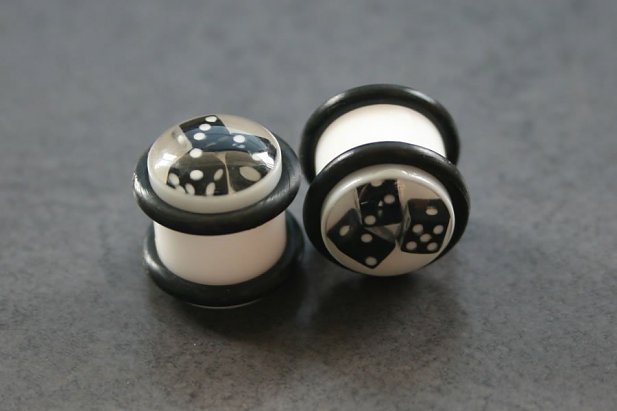 White Plugs with Black Dice